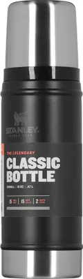 A black and silver Stanley Classic Bottle is shown against a white background.