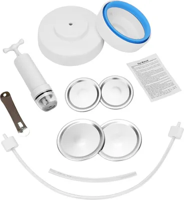 A collection of items for vacuum sealing mason jars, including a hand pump, lids, vacuum sealers, tubes, and a user manual.