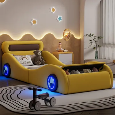 A child's bedroom with a yellow car-shaped bed, toys, and decorative star lights.