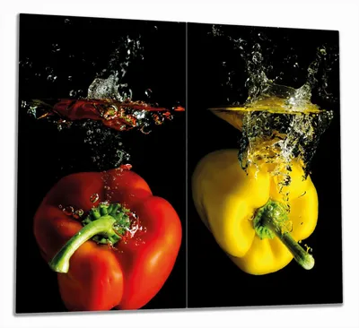 Produktbild von Wallario Herdabdeckplatte aus Glas, Größe 60 x 52 cm 2-teilig, Motiv Bunte Küche  Paprika in rot  gelb  orange und grün im Wasser