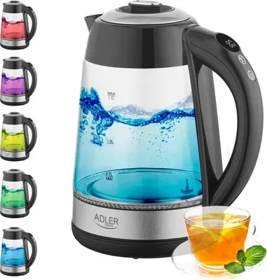 A glass electric kettle with a digital display and a cup of tea next to it. Several other kettles with different colored liquids are shown on the left.