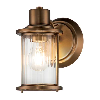 Zdjęcie produktu dla Kinkiet łazienkowy Riggs postarzany mosiądz 1xE27x40W metal wym:21,8x14x17,9cm IP44 Quoizel