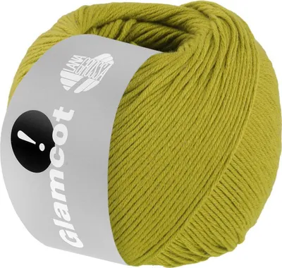 A ball of green yarn with a label wrapped around it.