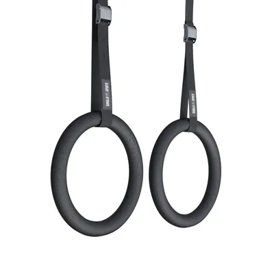 Two gymnastic rings hanging from straps against a white background.