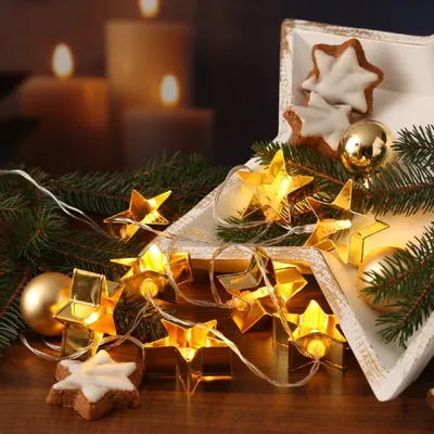Produktbild von LED Lichterkette Backförmchen goldene Sterne - 8 warmweiße LED - Batteriebetrieb - L: 1,4m - silber