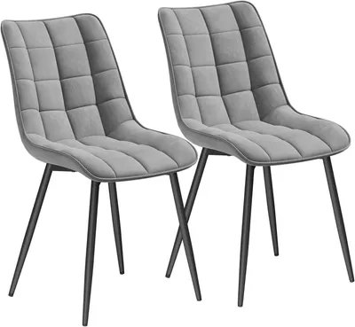 Two gray upholstered chairs with black metal legs are shown against a white background.