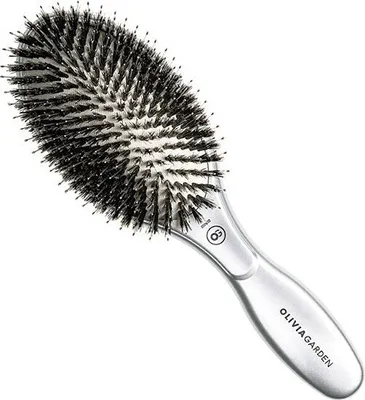 A silver hairbrush with black bristles is shown against a white background.
