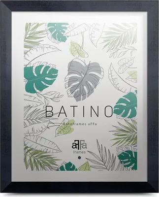 A framed picture with a botanical leaf design.