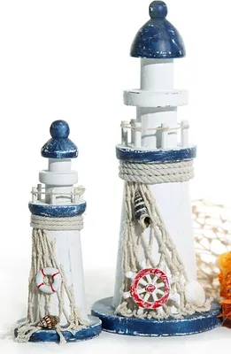 Two decorative lighthouses on a white background.