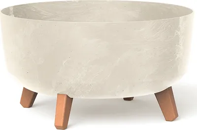 A cream-colored planter with a concrete effect and brown legs, shown against a white background.
