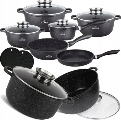 A collection of black cookware with a speckled marble coating, including pots, pans, and lids, arranged on a white background.