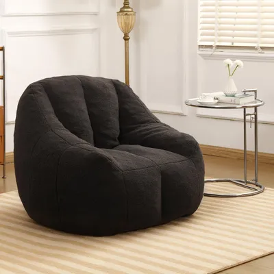 Immagine prodotto di Poltrona imbottita con braccioli e schienale, color grigio scuro, ideale per soggiorno e camera da letto