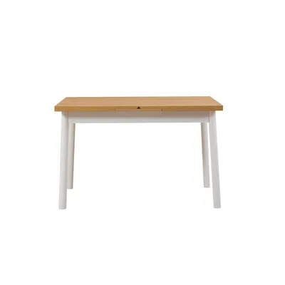 A white and wood dining table against a white background.