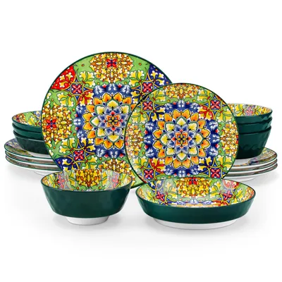 A set of colorful ceramic plates and bowls with a bohemian pattern, arranged on a white background.
