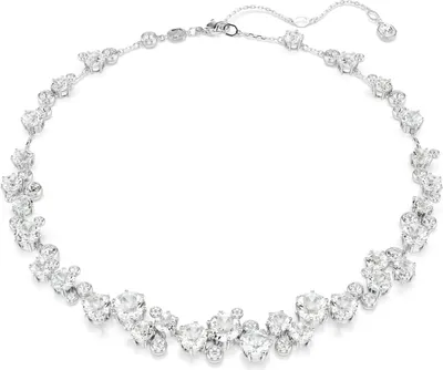 A close-up studio shot of a diamond necklace on a white background.