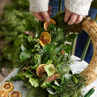 Produktbild von Potpourri aus Orangenscheiben, Zimtstangen und Kokossternen