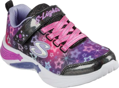 A single child's sneaker with a star pattern.