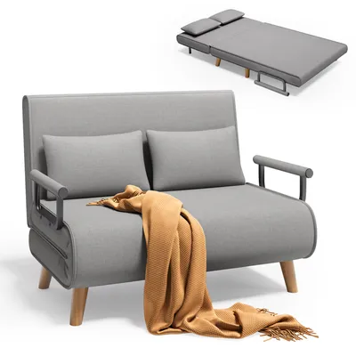 A grey sofa bed is shown in its sofa form, with a brown blanket draped over it. A separate image above shows the sofa bed converted into a bed.