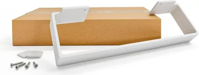 A white furniture leg bracket and screws are displayed on a white background, with a cardboard box in the background.