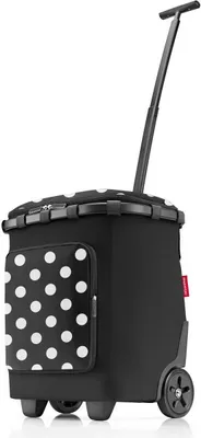 A black shopping trolley with white polka dots, shown from a three-quarter front angle against a white background.