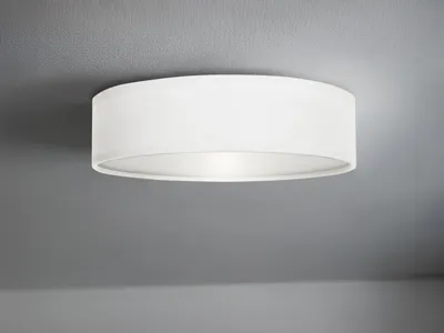 A white drum-shaped ceiling light fixture is shown mounted on a gray ceiling.