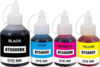 Four bottles of printer ink in black, cyan, magenta, and yellow.