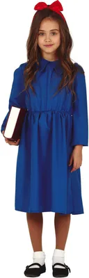 A young girl in a blue dress and red bow is holding a book.