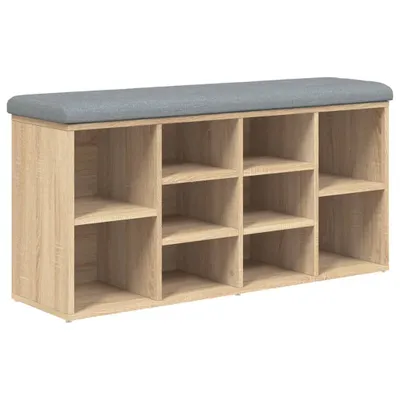 A shoe bench with multiple storage compartments and a padded seat.