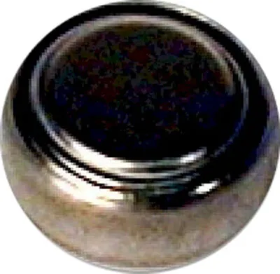 A close-up, top-down view of a silver coin-like object with a dark center.
