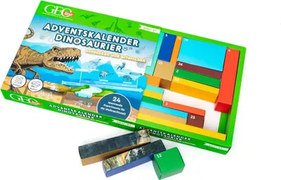 A box for a dinosaur-themed advent calendar with various colored blocks arranged inside.