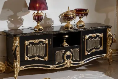 Produktbild von Casa Padrino Luxus Barock TV Schrank Schwarz / Gold - Prunkvolles Massivholz Sideboard mit 2 Türen und Schublade - Barock Möbel - Edel & Prunkvoll