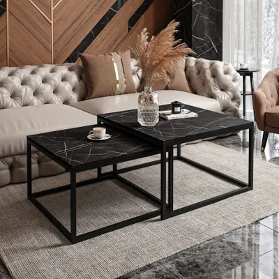 A living room scene with a couch, coffee tables, and decorative items.