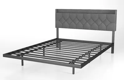 A bed frame with a tufted headboard is shown against a white background.