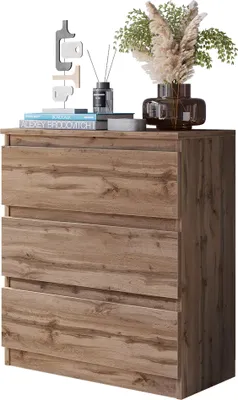 A wooden dresser with decorative items on top.