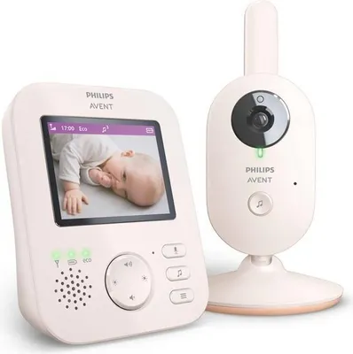A Philips Avent baby monitor set, consisting of a parent unit with a screen displaying a baby and a camera unit.