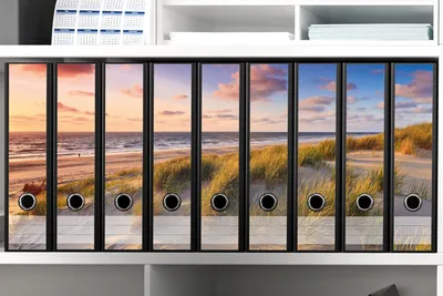 Produktbild von Wallario Ordnerrücken Sticker, selbstklebend für breite Ordner, 9 Stück, Motiv Abendspaziergang am Strand - Sonnenuntergang über dem Meer