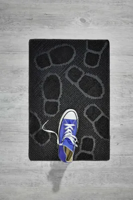 Produktbild von Fußmatte Step Füße schwarz, 40 x 60 cm