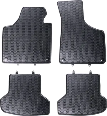 A set of four black rubber car floor mats with a honeycomb pattern, arranged on a white background.