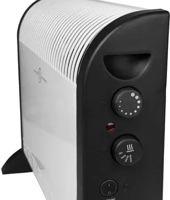 A close-up, angled view of a white and black electric heater.