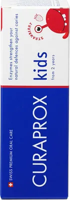 A close-up of a product box for children's toothpaste.