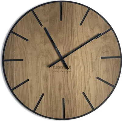A close-up view of a wooden wall clock with black hands and hour markers.