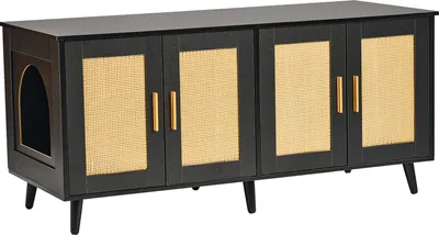 A black wooden cabinet with rattan accents and gold handles, designed to conceal a litter box, is shown against a white background.