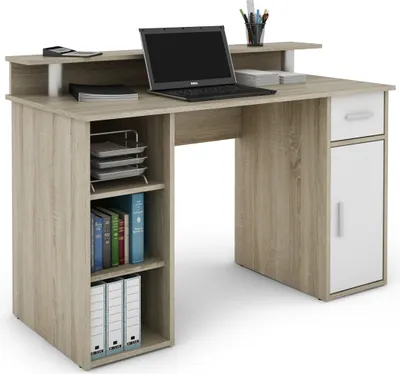 A desk with a laptop and office supplies.