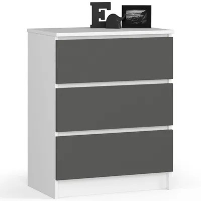 A chest of drawers with three drawers, shown from the front on a white background. Decorative items are on top.