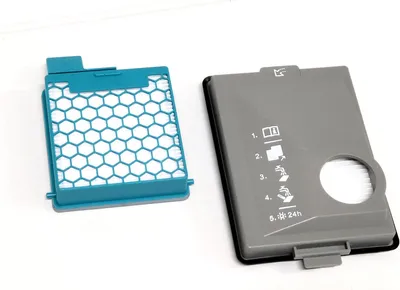 A teal filter and a gray filter cover are shown on a white background.