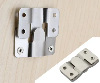 A close-up of a metal furniture connector attached to a wooden surface, with a smaller inset image of the same connector.