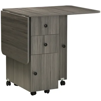 A dark gray folding kitchen table with drop leaves, drawers, and a cabinet, shown from a front-side angle on a white background.