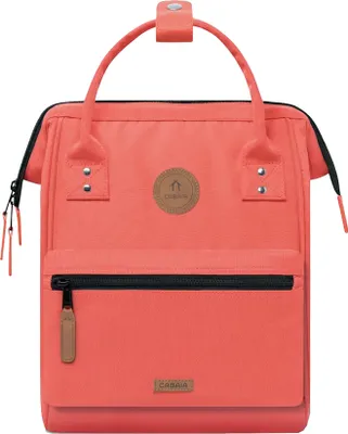 A studio shot of a coral-colored backpack.