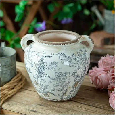 Imagen del producto de Jarrones para la decoración del salón: Maceta de cerámica con aspecto envejecido, de estilo retro-rústico, en color gris. Ideal para el salón