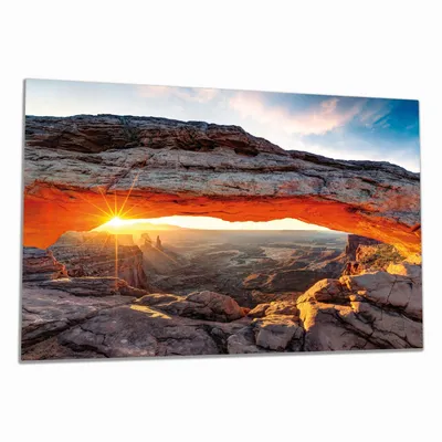 Produktbild von Wallario Herdabdeckplatte aus Glas, Größe 80 x 52 cm 1-teilig, Motiv Sonnenstrahl am Horizont  Leuchtende Felsspalte